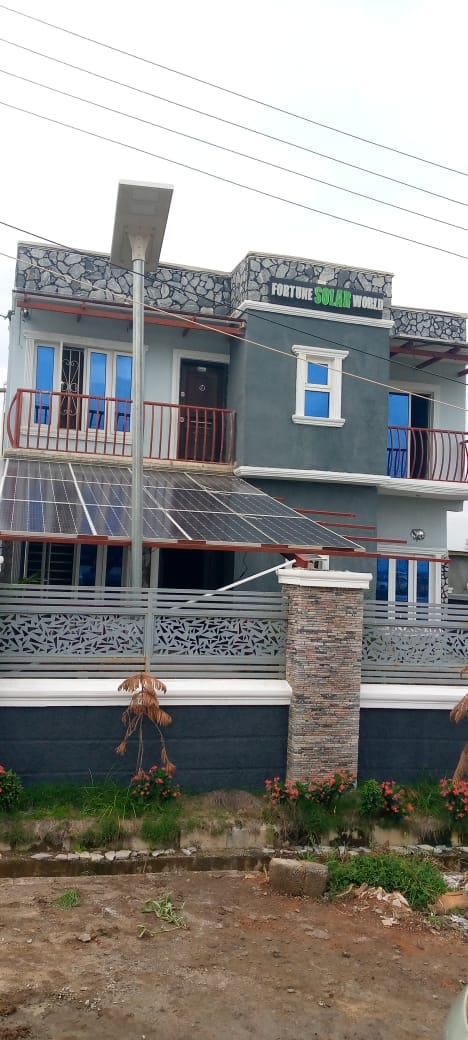 Fortune Solar World office with solar panels and a solar street light