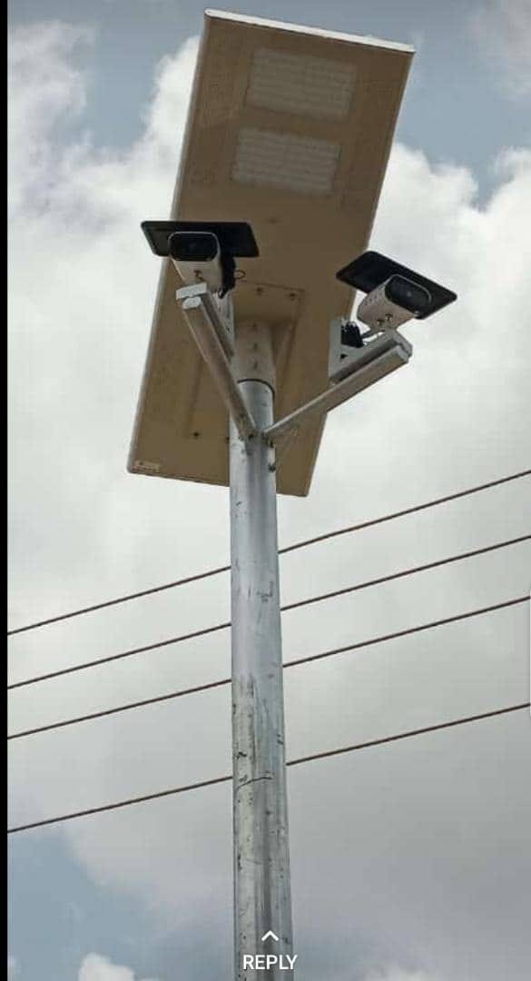 Solar-powered security light with dual floodlights